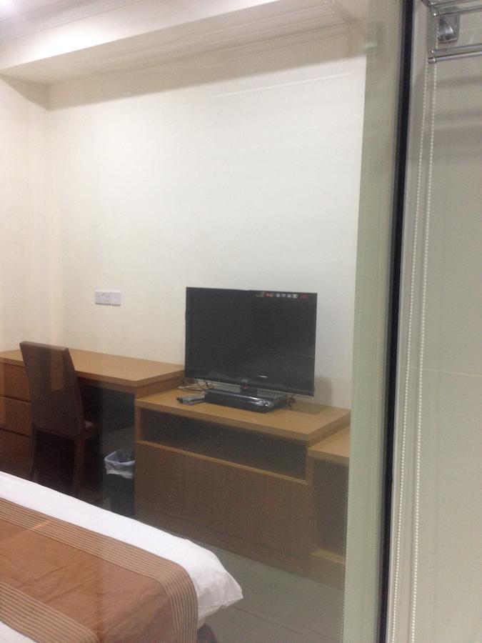 New Cape Inn Singapura Bilik gambar