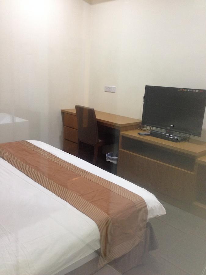 New Cape Inn Singapura Bilik gambar